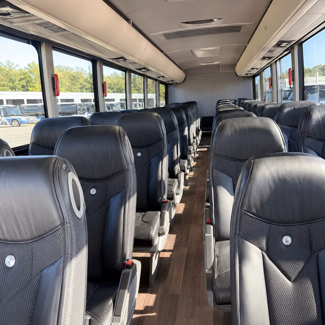 reliable charter bus shuttles between cupertino and moffett federal airfield